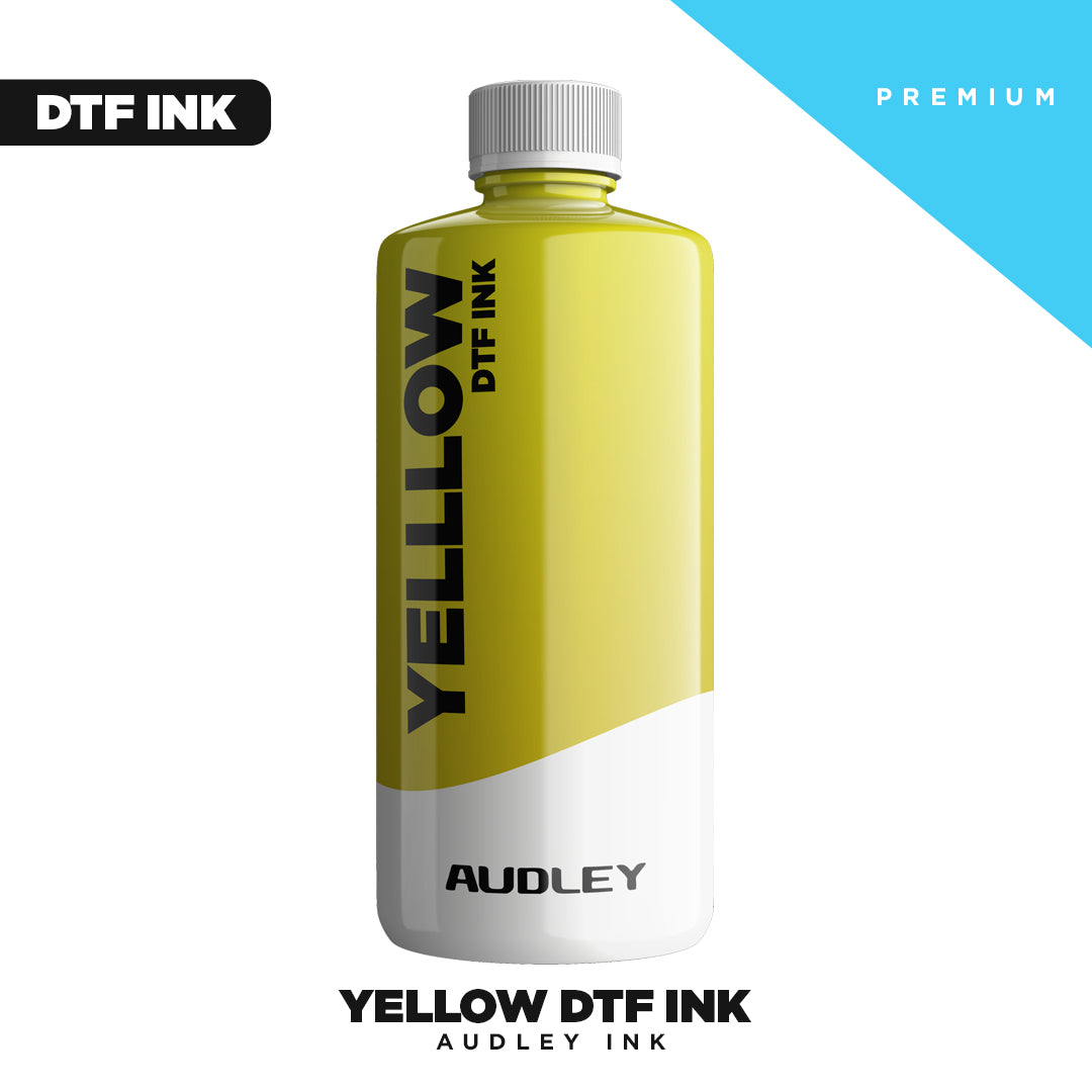 A yellow bottle labeled "Premium Yellow DTF INK" and "DTF Locker" stands upright on a white background, ideal for DTF printing. Bold text reads "DTF INK" at the top left and "PREMIUM" on a blue section at the top right.